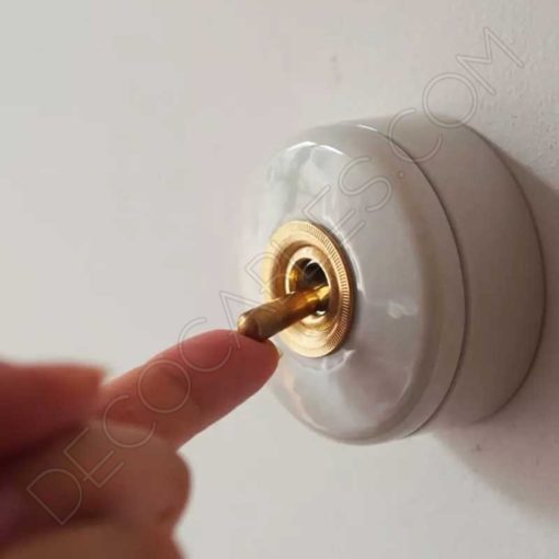 Interruptor conmutado de porcelana Vintage serie oro - Decocables